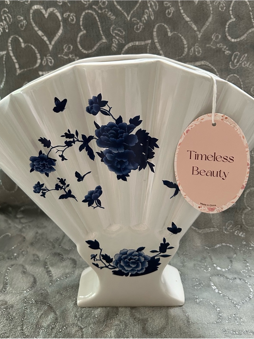 NWT Timeless Beauty White Ceramic Fan Vase with Blue Floral Motif